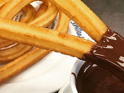 Prepared ridged churros on a plate