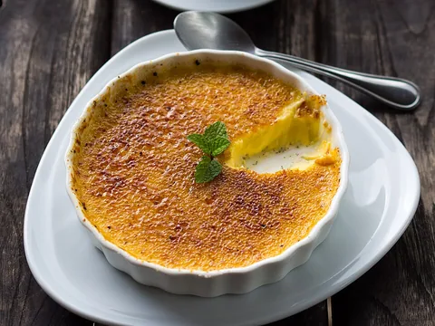 A prepared crème brûlée in a ramekin