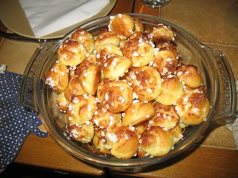 Prepared choux pastry shells with pearl sugar