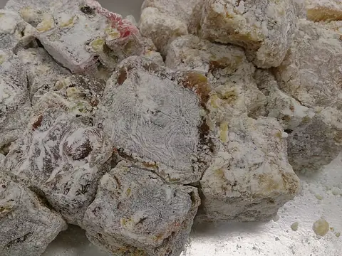 Powdered Turkish lokum cubes containing nuts