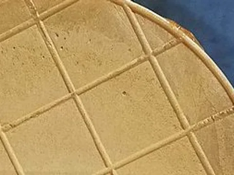 Close view of the patterned surface of an unwrapped oblea wafer