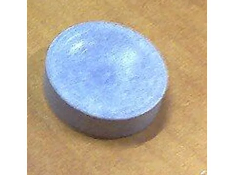Small round purple Parma Violets candy tablets