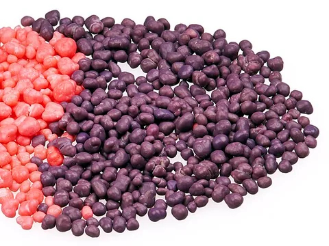 Strawberry and grape Nerds sugar-pebble candies
