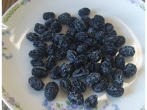 Traditional amanattō sugar-candied black soybeans