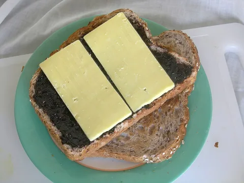 Marmite spread on toast, served with cheese