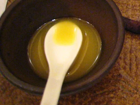 Prepared pungent mustard condiment in a bowl