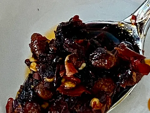 Chilli crisp with visible chilli and crunchy ingredients