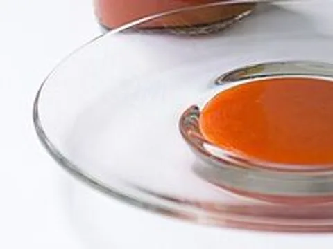 Sriracha chilli sauce on a clear plate