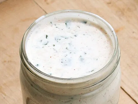 Prepared ranch dressing in a glass jar