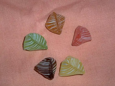 Five colourful striped berlingot candies