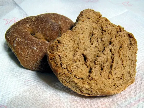Dry twice-baked frisella bread rings on white cloth