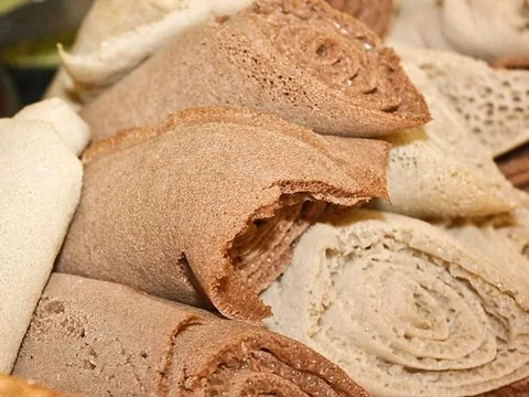 Closeup of rolled spongy Ethiopian injera
