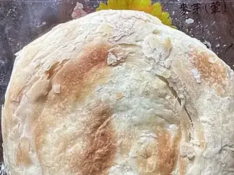 An unwrapped Taiwanese sun cake