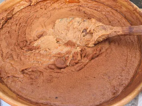 Refried beans in a terracotta pan