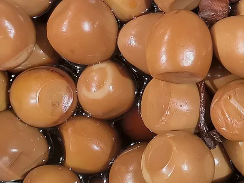 Spiced braised quail eggs