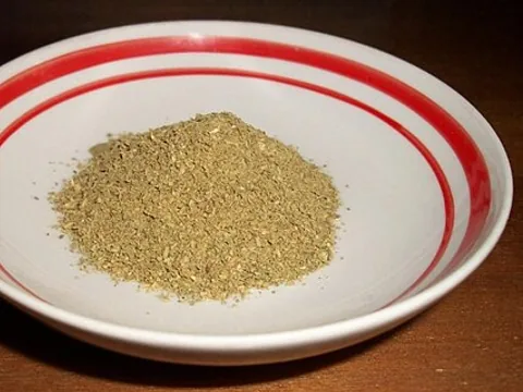 Khmeli suneli spice powder on a white plate