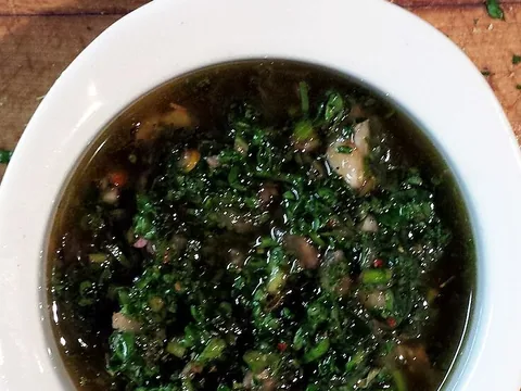 Prepared chimichurri herb sauce in a bowl