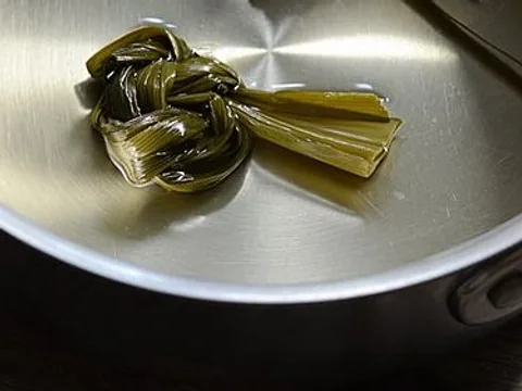 Culinary pandan leaves tied for infusion